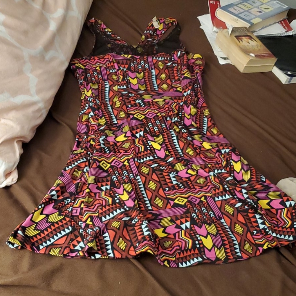 Patterned dress with sheer top part